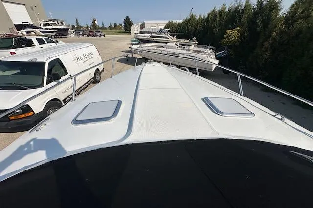 Slide: The Image of Throttle controls on a 2008 Formula 330 Sun Sport boat dashboard. - 16