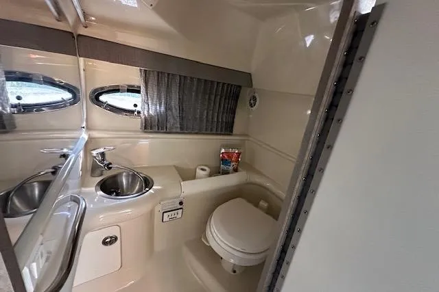 Slide: The Image of Control panel on 2008 Formula 330 Sun Sport boat with carbon monoxide warning label. - 19