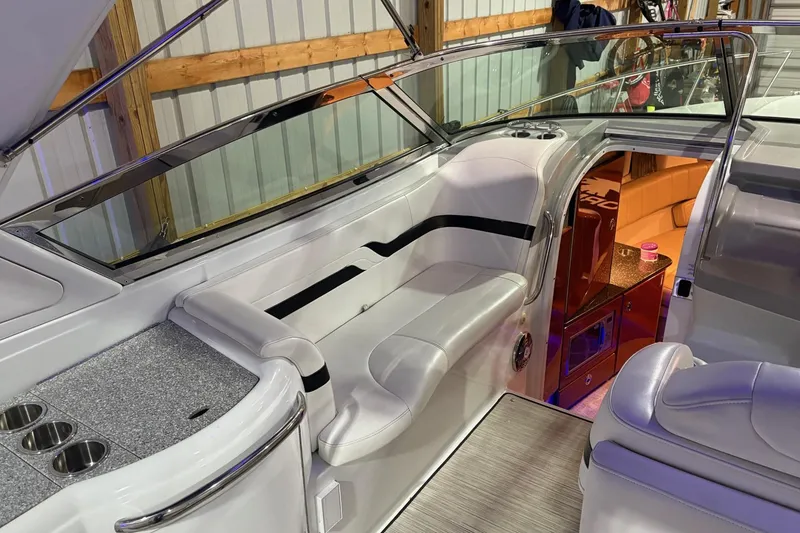 Slide: The Image of Engine compartment of a 2008 Formula 330 Sun Sport boat, featuring dual engines. - 28