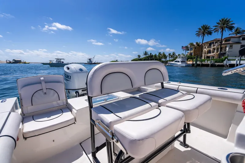 Slide: The Image of 2026 Sea Born LX21 Center Console boat with comfortable seating on a sunny day. - 33