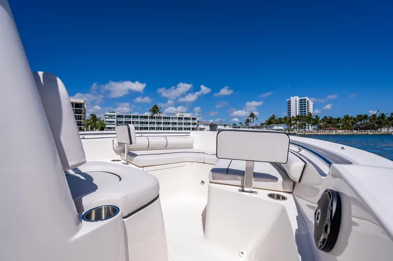 Slide: The Image of 2026 Sea Born LX21 Center Console boat with seating, ocean view, and blue sky. - 43