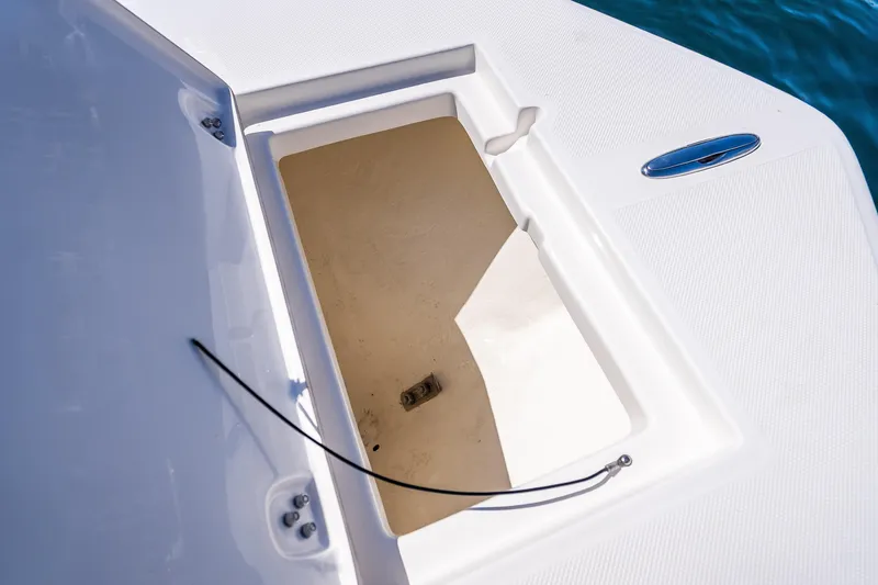Slide: The Image of Open storage compartment on 2026 Sea Born LX21 Center Console boat. - 48