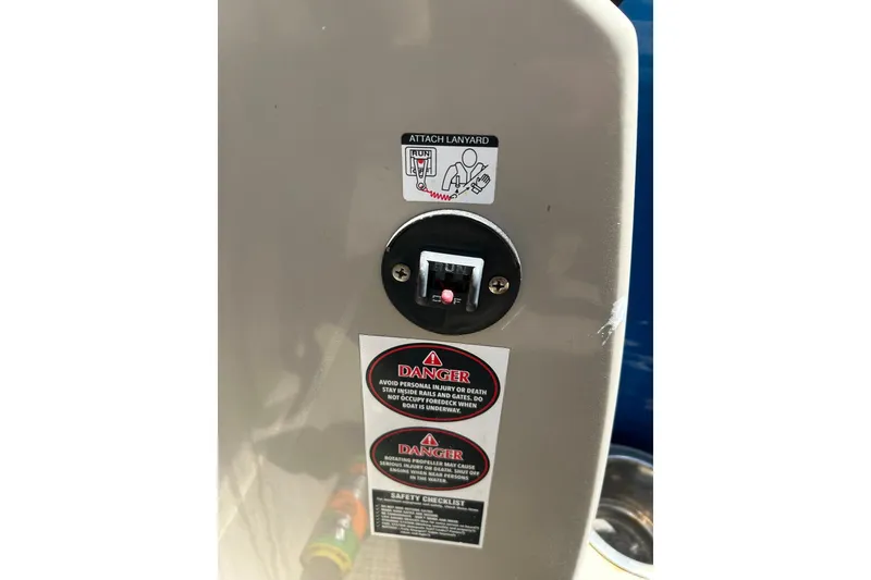 Slide: The Image of Safety warning labels on 2020 Cypress Cay Seabreeze 232 boat dashboard. - 14