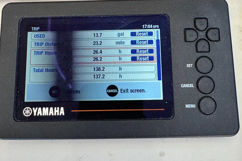 Slide: The Image of Yamaha display showing trip data on a 2018 Chris-Craft Calypso 30 boat. - 18