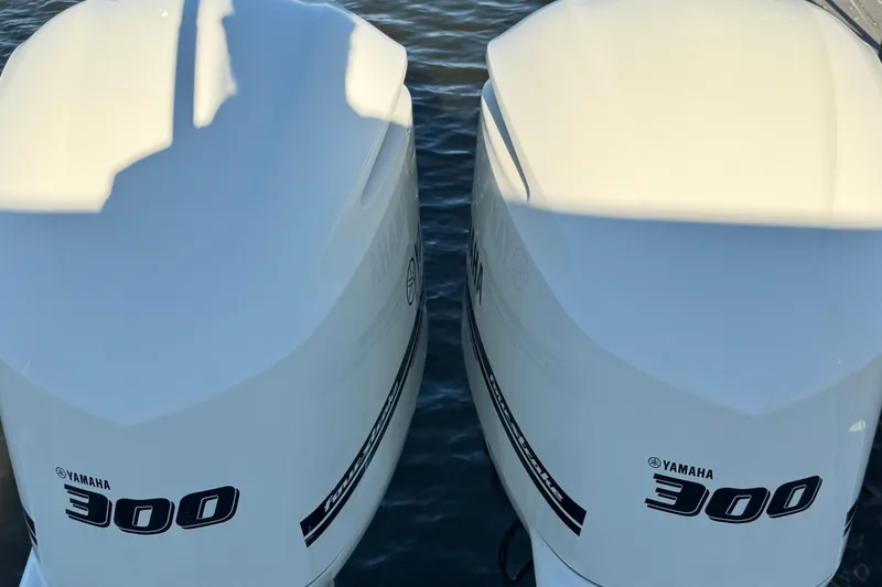 Slide: The Image of Twin Yamaha 300 outboard engines on a 2018 Chris-Craft Calypso 30 boat. - 4