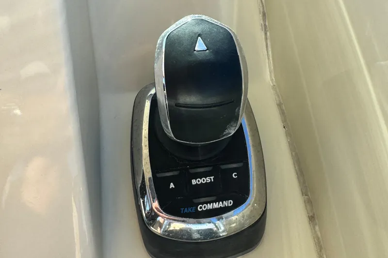 Slide: The Image of Control lever of a 2018 Chris-Craft Calypso 30 boat with "Take Command" label. - 7