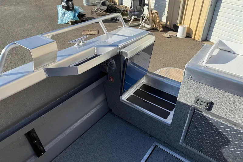 Slide: The Image of Interior view of 2025 Thunder Jet 24 Alexis Pro boat, showcasing sleek aluminum design. - 13
