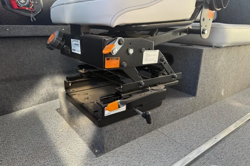 Slide: The Image of Adjustable seat mechanism in 2025 Thunder Jet 24 Alexis Pro boat interior. - 24