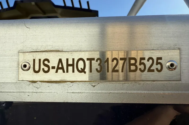 Slide: The Image of 2025 Thunder Jet 24 Alexis Pro boat identification plate with serial number. - 39