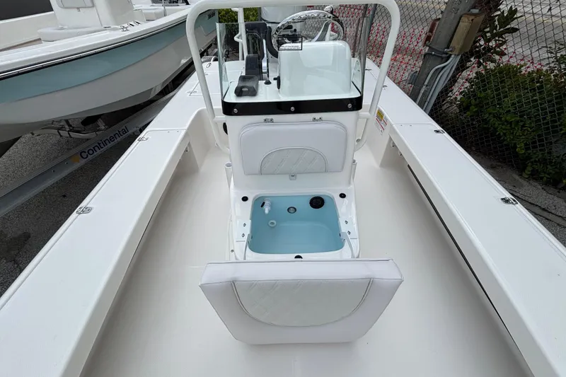 Slide: The Image of 2026 Spyder FX19 Vapor boat interior with console and seating. - 11