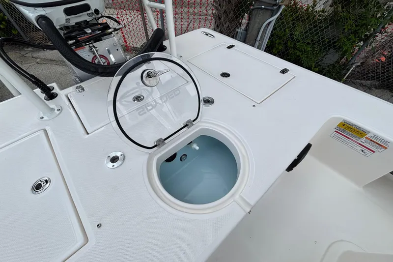 Slide: The Image of 2026 Spyder FX19 Vapor boat deck with livewell and control panel. - 16