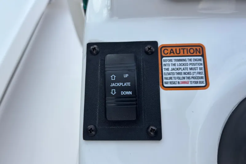 Slide: The Image of Switch panel on 2026 Spyder FX19 Vapor boat with caution label. - 21