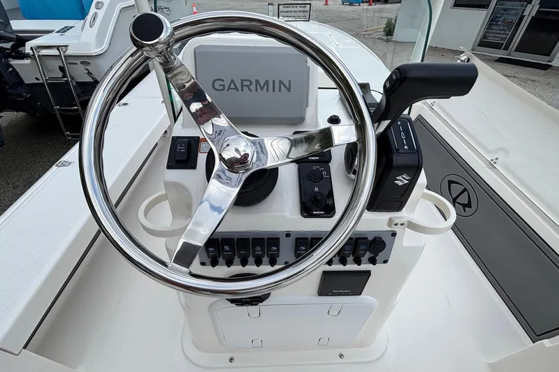 Slide: The Image of Steering console of 2026 Spyder FX19 Vapor boat with Garmin navigation system. - 22