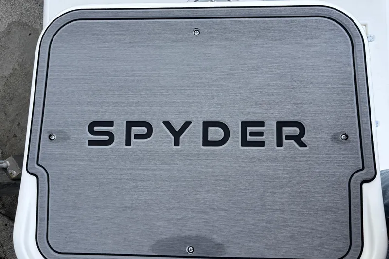 Slide: The Image of Spyder FX19 Vapor 2026 logo on metallic surface, showcasing sleek design. - 7