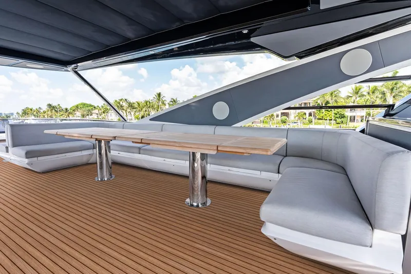 Slide: The Image of Luxurious outdoor seating on 2024 Sunseeker 90 Ocean yacht with sleek design and wooden deck. - 19