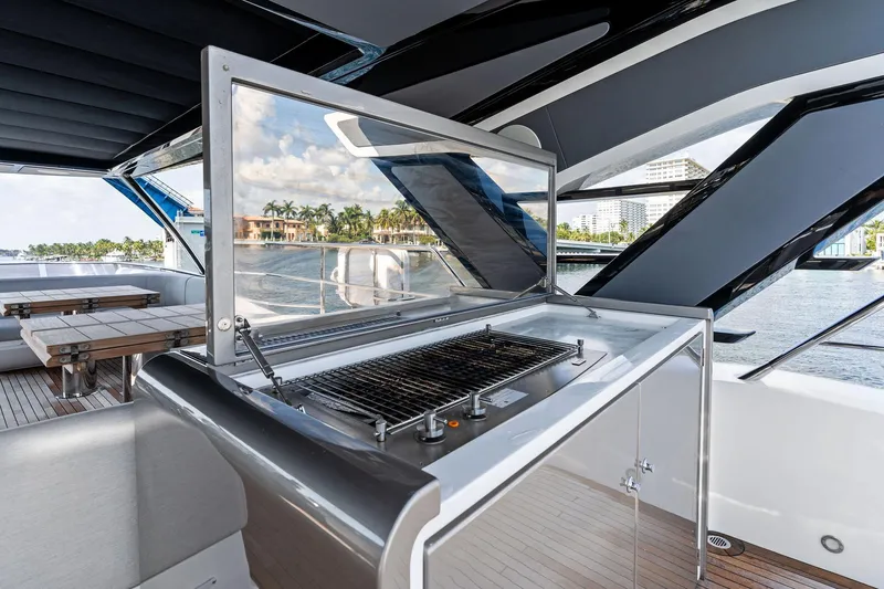 Slide: The Image of Outdoor grill on 2024 Sunseeker 90 Ocean yacht, with scenic waterfront view. - 22