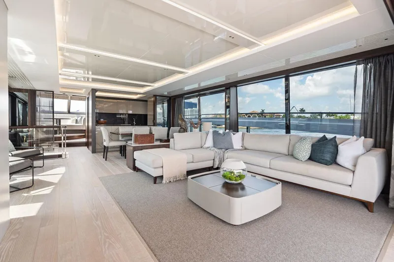 Slide: The Image of Luxurious interior of 2024 Sunseeker 90 Ocean yacht with elegant seating and panoramic windows. - 34