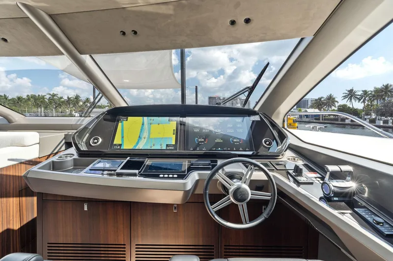 Slide: The Image of Luxurious 2024 Sunseeker 90 Ocean yacht cockpit with advanced navigation system and sleek design. - 37