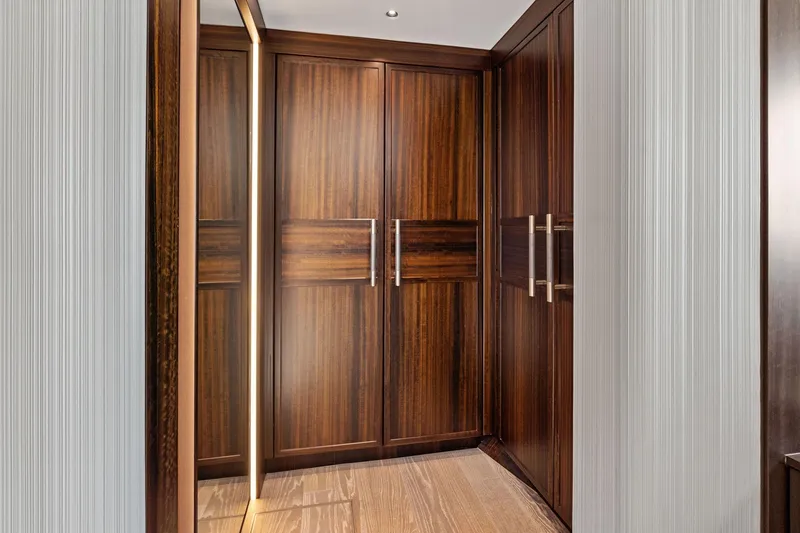 Slide: The Image of Luxurious wooden cabinetry in 2024 Sunseeker 90 Ocean yacht interior. - 54
