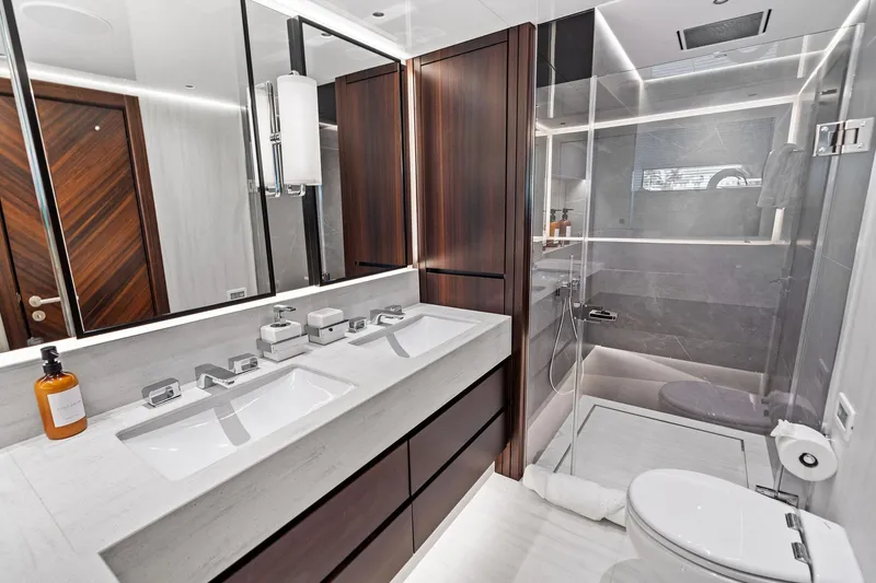 Slide: The Image of Luxurious bathroom in 2024 Sunseeker 90 Ocean yacht, featuring modern fixtures and elegant design. - 57