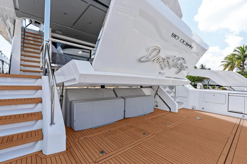 Slide: The Image of 2024 Sunseeker 90 Ocean yacht deck with stairs and sleek design. - 6