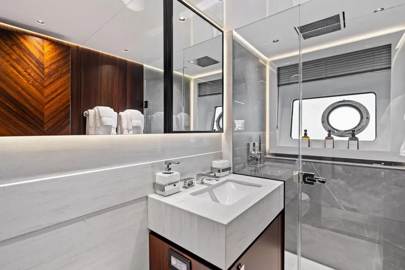 Slide: The Image of Luxurious bathroom in 2024 Sunseeker 90 Ocean yacht, featuring modern design and elegant fixtures. - 62