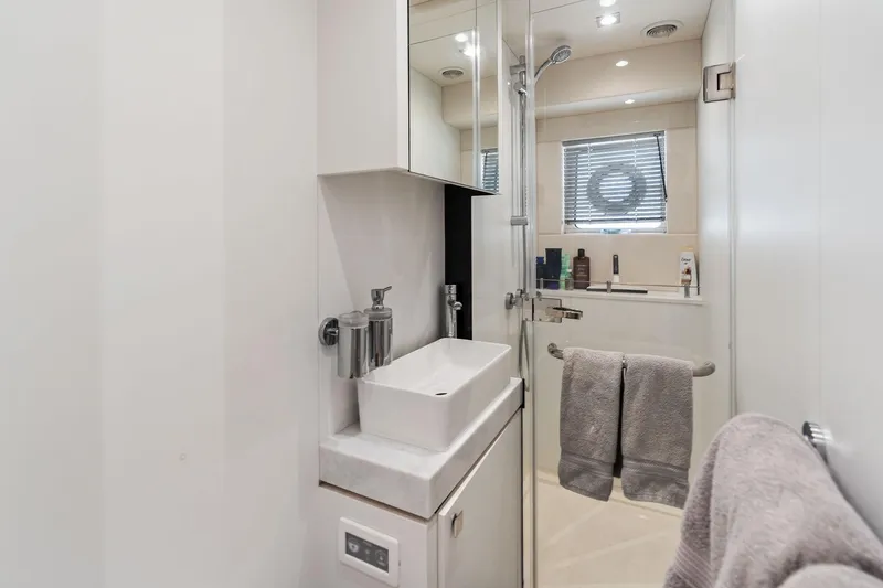 Slide: The Image of Luxurious bathroom in 2024 Sunseeker 90 Ocean yacht, featuring modern fixtures and elegant design. - 72