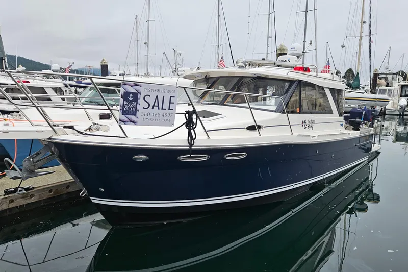 Slide: The Image of 2020 Cutwater C-32 C yacht for sale, docked in marina with sale sign. - 2