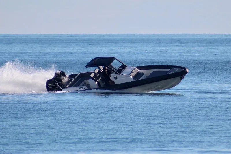 The Image of 2026 Northstar ION 12 boat speeding on open water. - 0