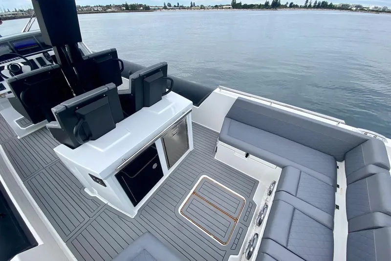 Slide: The Image of Luxurious 2026 Northstar ION 12 boat interior with sleek seating and modern design. - 14