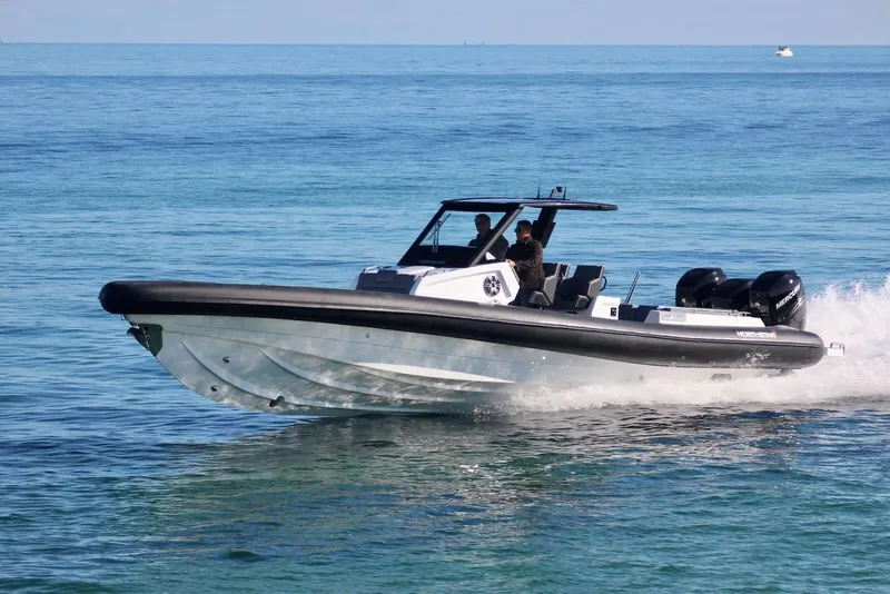 Slide: The Image of 2026 Northstar ION 12 boat cruising on clear blue water. - 7