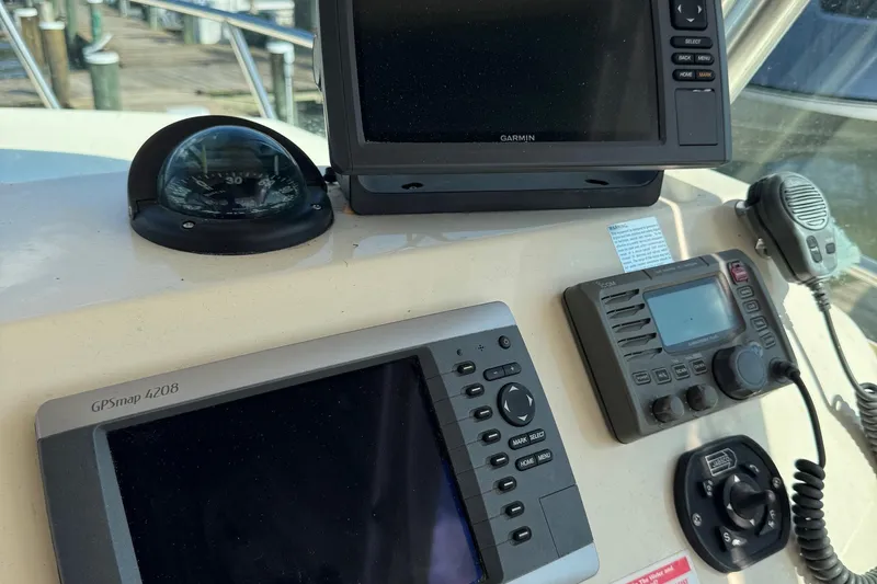 Slide: The Image of Control panel of 2011 Parker 2510 XL Walkaround with GPS and communication devices. - 11