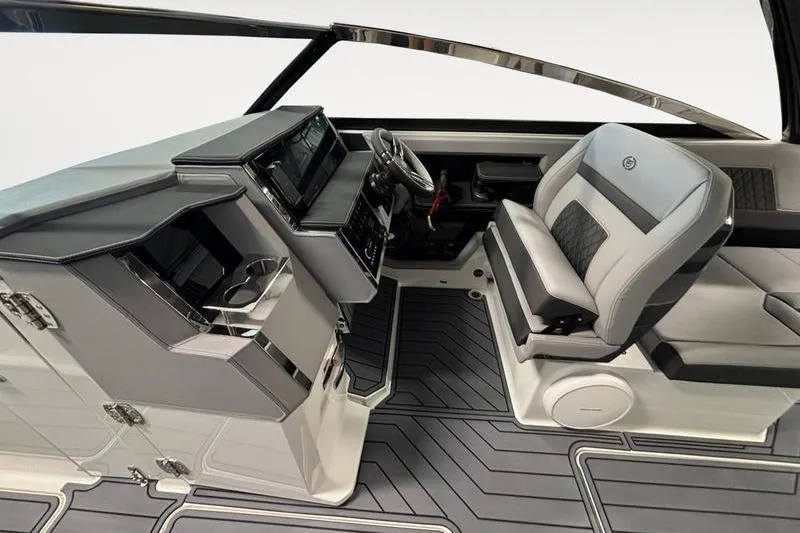 Slide: The Image of 2026 Cobalt R33 boat interior with modern dashboard and luxurious seating. - 16