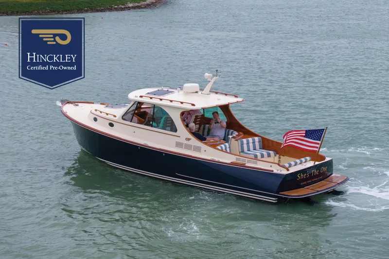 The Image of 2019 Hinckley Picnic Boat 34 cruising on water, certified pre-owned. - 0