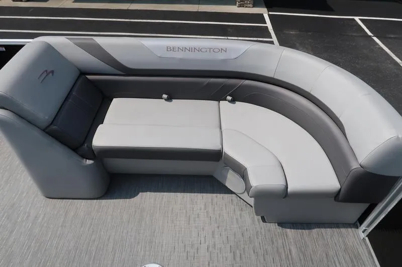 Slide: The Image of 2023 Bennington 22 SXSR boat seating, featuring luxurious gray upholstery and spacious design. - 30