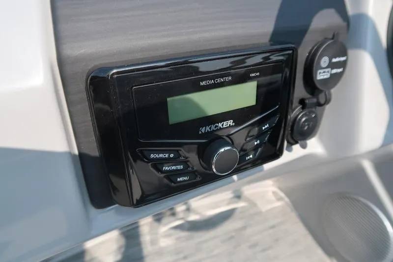 Slide: The Image of Kicker media center on 2023 Bennington 22 SXSR boat dashboard. - 31