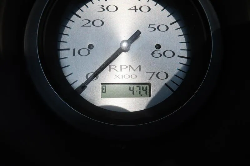Slide: The Image of Tachometer of 2023 Bennington 22 SXSR showing 4714 RPM. - 34