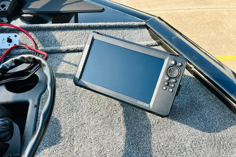 Slide: The Image of Fishfinder on 2026 Tracker Pro Team 195 boat dashboard, featuring navigation controls. - 10