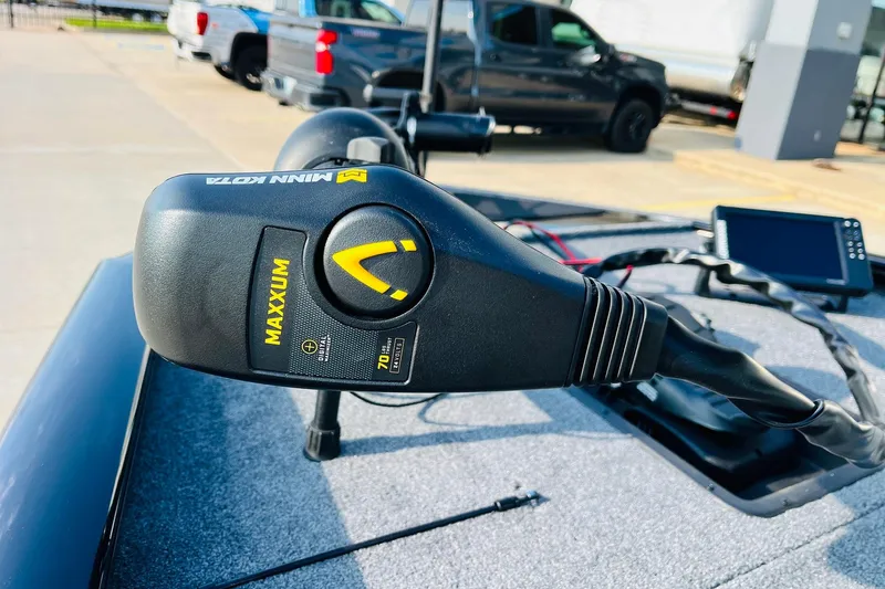 Slide: The Image of Minn Kota Maxxum trolling motor on 2026 Tracker Pro Team 195 boat deck. - 11