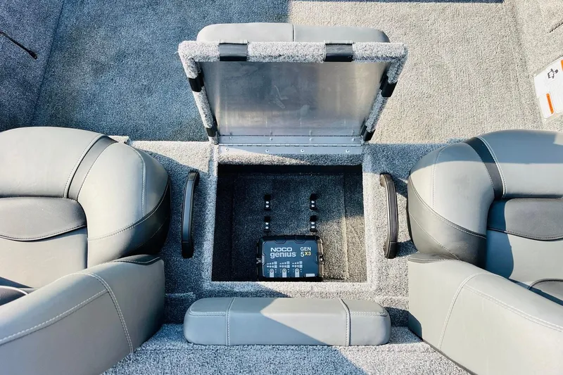 Slide: The Image of Interior of 2026 Tracker Pro Team 195 boat with NOCO Genius GEN5X3 charger. - 26