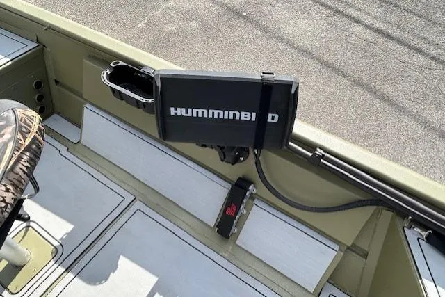 Slide: The Image of 2024 Lund 1660 Predator Tiller boat with Humminbird fish finder installed. - 12