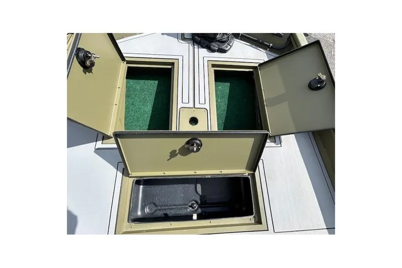 Slide: The Image of 2024 Lund 1660 Predator Tiller boat storage compartments open, showcasing interior space. - 9