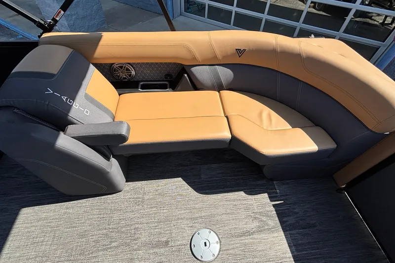 Slide: The Image of Luxurious seating in 2026 Viaggio Z24U boat, featuring tan and gray upholstery. - 11