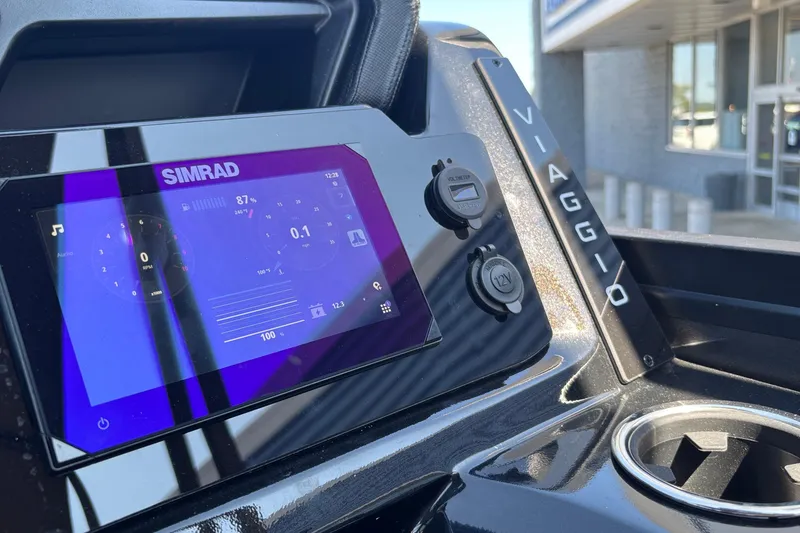 Slide: The Image of Dashboard of 2026 Viaggio Z24U with Simrad display and controls. - 13