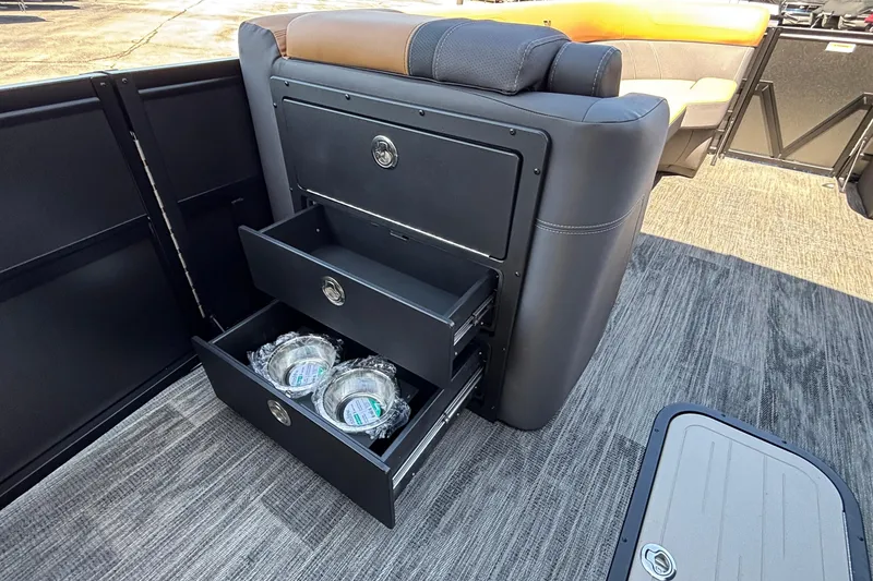 Slide: The Image of Interior of 2026 Viaggio Z24U boat with open storage drawers and seating. - 22