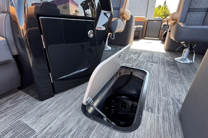 Slide: The Image of Interior of 2026 Viaggio Z24U with open floor storage compartment, modern seating, and sleek design. - 29