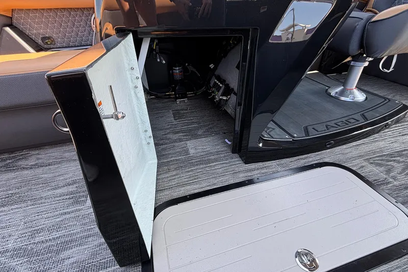 Slide: The Image of Open storage compartment in 2026 Viaggio Z24U boat interior, featuring modern design and seating. - 30