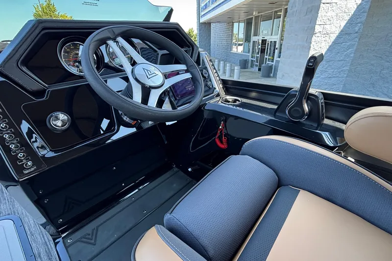 Slide: The Image of Interior of 2026 Viaggio Z24U boat, featuring modern steering wheel and controls. - 32