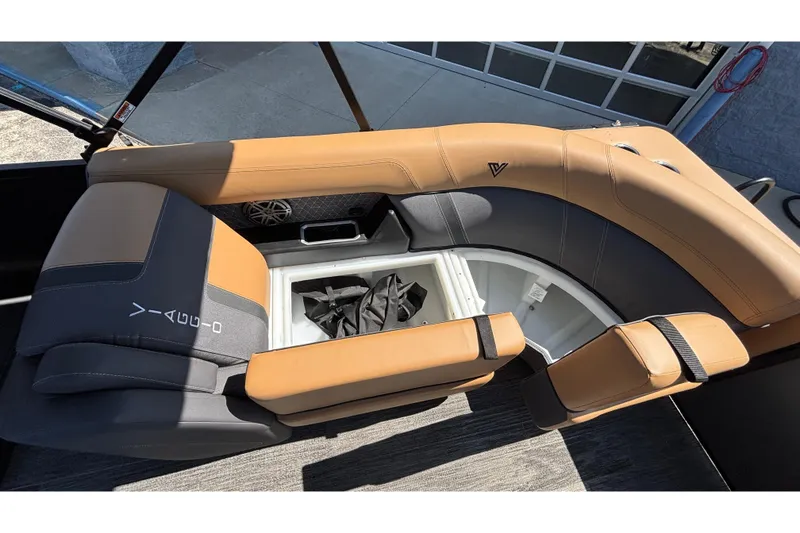 Slide: The Image of Luxurious seating on 2026 Viaggio Z24U boat with storage compartment open. - 36