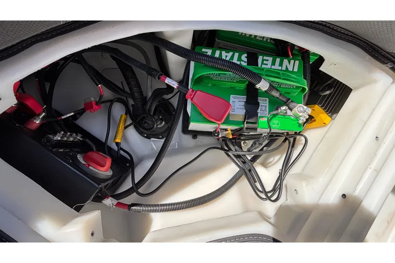 Slide: The Image of Battery compartment of 2026 Viaggio Z24U with wiring and components visible. - 38